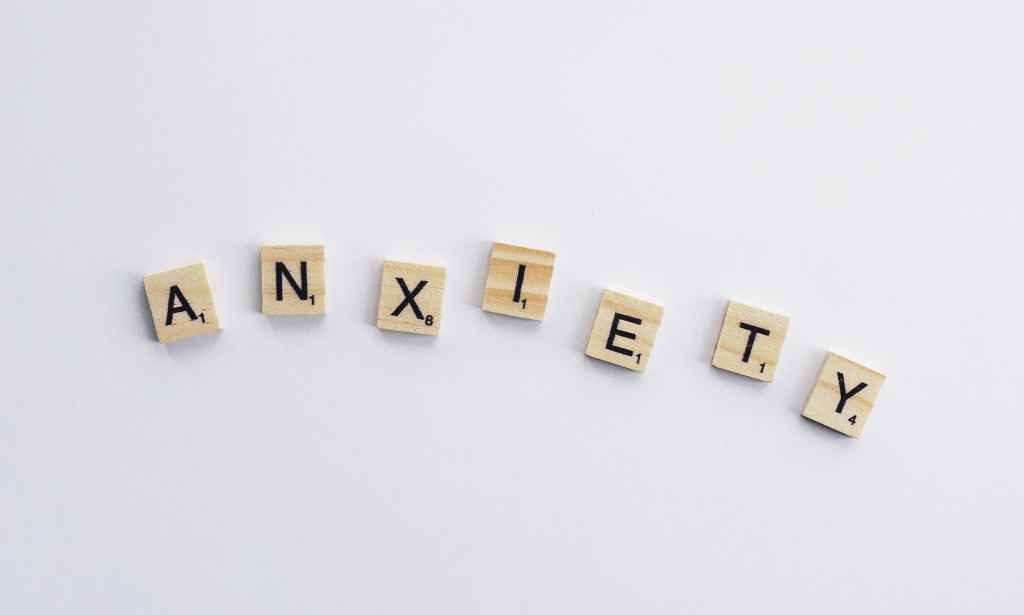 On a white background there are letters saying ANXIETY.